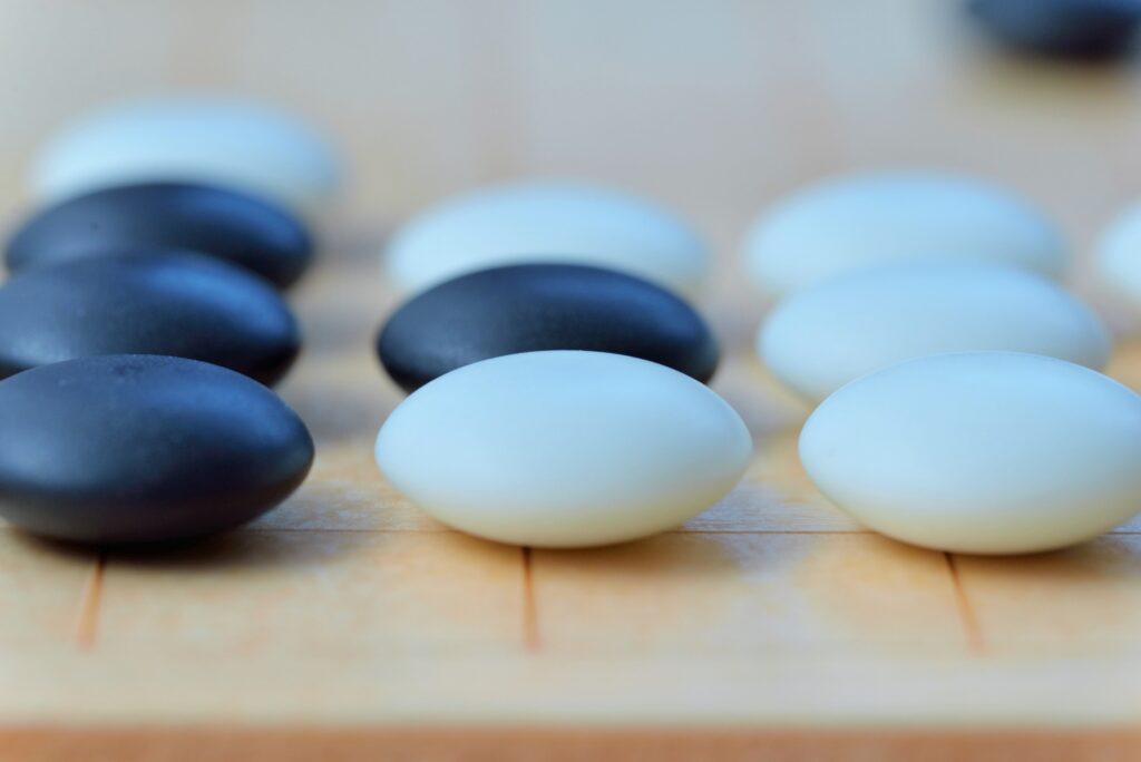 AlphaGo by DeepMind defeated champions, advancing artificial intelligence in gaming