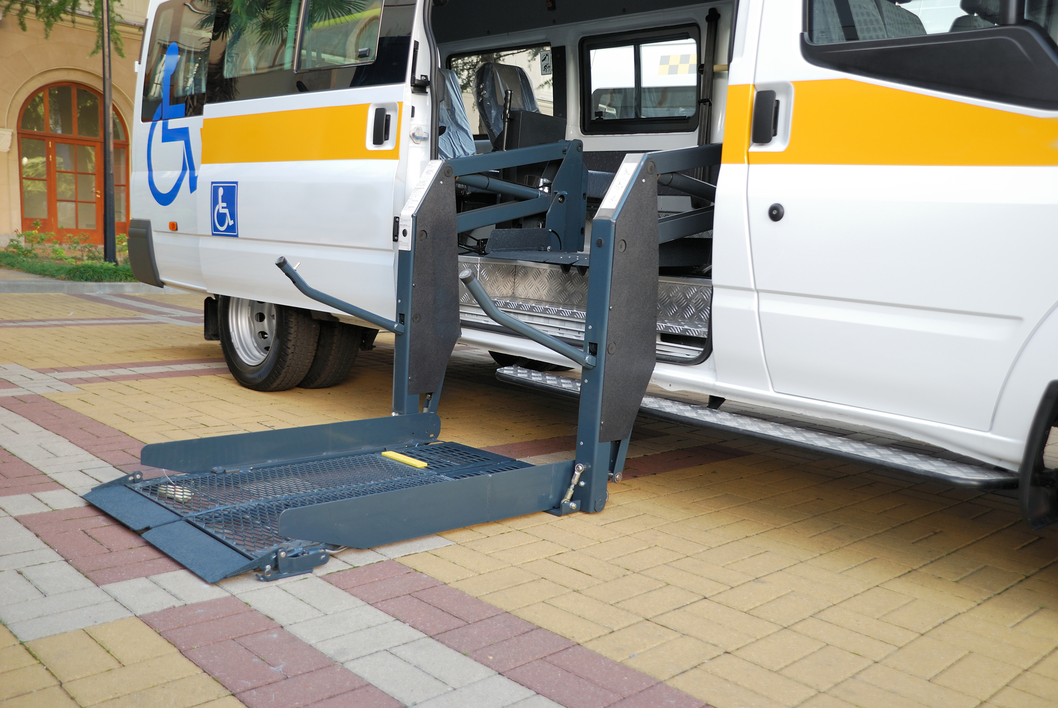 A wheelchair lift provides safe, easy access in home or van